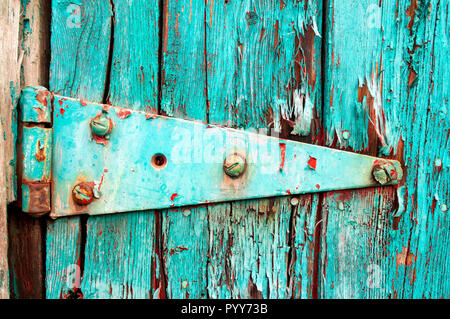 Peeling Türkis Farbe und Scharnier Stockfoto