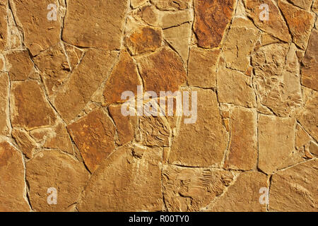 Detail der Wand mit formlosen Fliesen als Textur Stockfoto
