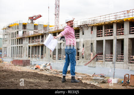 Architekten auf der Baustelle Feiern nach dem Bau Projekt war erfolgreich. Stockfoto