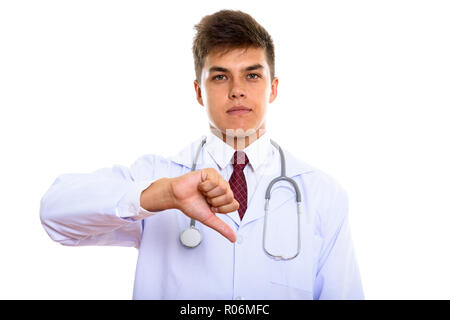 Studio shot Junger stattlicher Mann Arzt, der Daumen nach unten Stockfoto