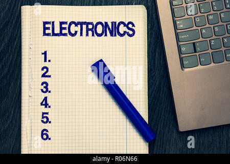 Text Zeichen angezeigt Elektronik. Konzeptionelle foto Schaltungen oder Geräte mit Transistoren, Mikrochips digitale Gerät öffnen Notebook squared Seite schwarz Marke Stockfoto