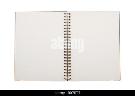 Ansicht von oben closeup von open Notebook mit Kupfer metall Spiralen und Braun gebunden werden leere Seiten isoliert auf weißem Stockfoto