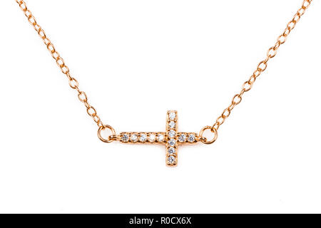 Golden Christentum Kreuz Anhänger mit Diamanten auf einer Kette Stockfoto
