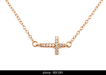 Golden Christentum Kreuz Anhänger mit Diamanten auf einer Kette Stockfoto