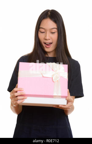 Überrascht schöne asiatische teenage Mädchen Geschenk öffnen Stockfoto