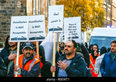Glasgow, UK. 4. Nov 2018. Mehrere hundert sunnitische und schiitische Muslime zogen durch die Govanhill District von Glasgow die Aufmerksamkeit auf die Ungerechtigkeiten und Gewalt zu bringen, wird derzeit in den Nahen Osten im Namen des Islam verübt werden. Der März war zeitlich mit dem traditionellen islamischen Prozession ABRA'EEN (JULOOS), der seit 61 AH im Islamischen Kalender (10. Oktober 680) nach der Schlacht von Kerbela Credit: Findlay/Alamy Leben Nachrichten beobachtet wurde, übereinzustimmen Stockfoto