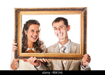 Braut und Bräutigam im Rahmen Stockfoto