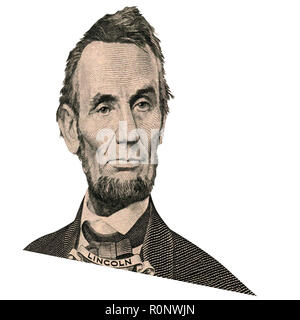 Portrait des ehemaligen US-Präsident Abraham Lincoln, wie er schaut auf fünf Dollar bill Vorderseite. Foto in einem Winkel von 15 Grad. Stockfoto