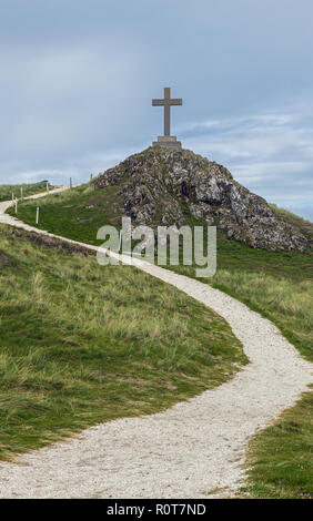 St Llanddwyn Dwynwens Kreuz auf der Insel Anglesey im Norden von Wales Stockfoto
