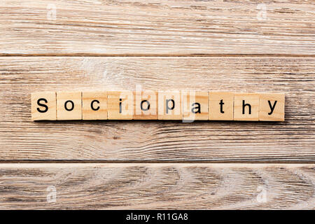 Sociopathy Wort auf Holz Block geschrieben. sociopathy Text auf Tisch, Konzept. Stockfoto