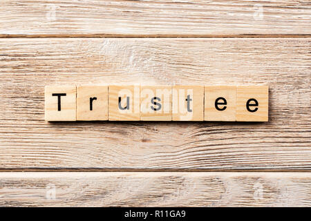 Treuhänder Wort auf Holz Block geschrieben. treuhänder Text auf Tisch, Konzept. Stockfoto