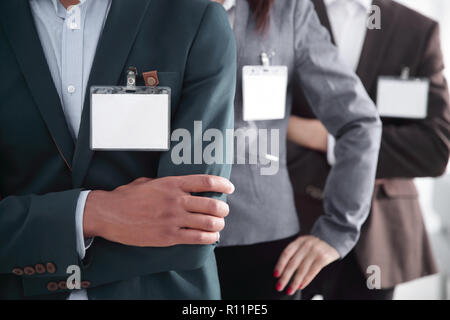 Closeup. Gruppe von Geschäftsleuten mit leeren Namensschilder Stockfoto