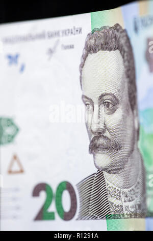 Neue banknotenstückelung von 20 UAH. Ukrainische Geld hautnah. Fragment von Banknoten Stockfoto