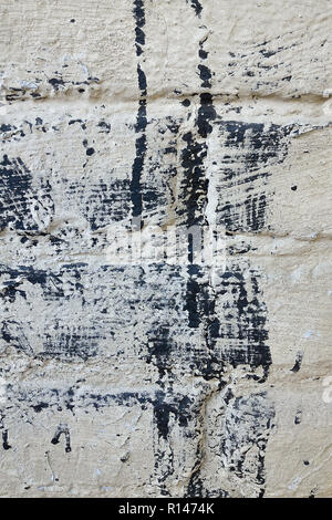Weiße Wand mit schwarzem Lack Stockfoto