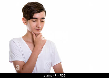 Studio shot der jungen schönen persischen Teenager denken beim Stockfoto