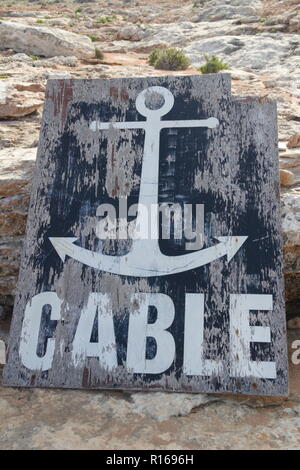 Ein Zeichen mit einem Anker Stockfoto