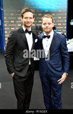 August Wittgenstein und Stefan Konarske die Teilnahme an der 20. GQ Männer des Jahres" in der Komischen Oper am 8. November 2018 in Berlin, Deutschland. Stockfoto