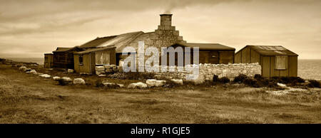 Alte Cottage und holzhütten am Portland Bill, Küste von Dorset, England Stockfoto