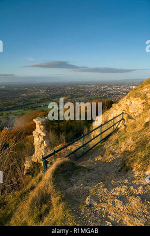 Europa, England, Gloucestershire, Cotswolds, die Teufel Schornstein glühen in der Abendsonne auf Leckhampton Hill oberhalb der Stadt Cheltenham Stockfoto