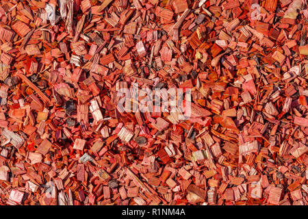 Rasen streuten durch rote Holzchips, nahtlose Textur Stockfoto