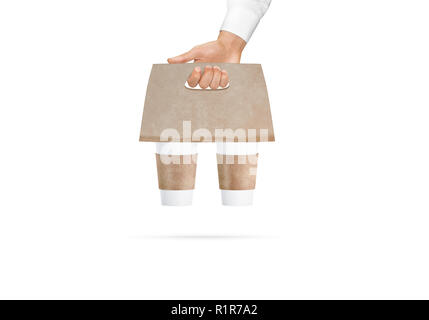 Leere weiße Kaffeetassen Handwerk Träger Halter in der Hand Mockup, isoliert. Leere nehmen Sie Kaffee oder Tee im Arm mock up. Trinken fach Package Template. Kraftpapier Hülse für heiße Getränke. Stockfoto