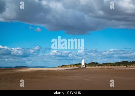 Druckt in den Sand am Strand Stockfoto