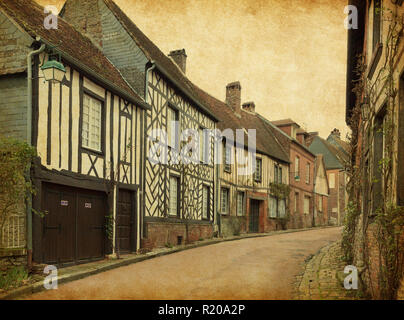 Penne. Alte Straße im mittelalterlichen Dorf. Noyon ist eine französische Gemeinde im Département Oise in Frankreich. Foto im Retro-Stil. Papier Textur. Stockfoto