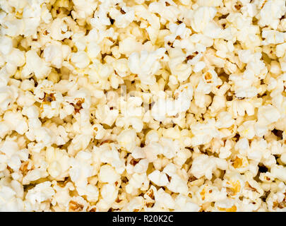 Der ganze Hintergrund mit schönen gelben Popcorn abgedeckt ist, Hintergrund. Stockfoto