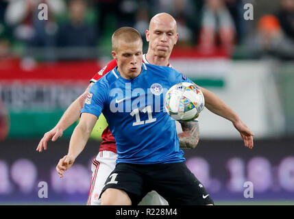 Budapest, Ungarn. 15. November 2018. Henrik Ojamaa Estlands #11 konkurriert für die Kugel mit botond Barath von Ungarn (r) während der UEFA Nationen League Match zwischen Ungarn und Estland an Groupama Arena am 15. November 2018 in Budapest, Ungarn. Credit: Laszlo Szirtesi/Alamy leben Nachrichten Stockfoto