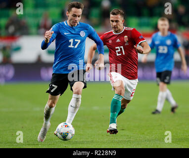 Budapest, Ungarn. 15. November 2018. (L - r) Siim Luts Estlands konkurriert für die Kugel mit Dominik Nagy in Ungarn während der UEFA Nationen League Match zwischen Ungarn und Estland an Groupama Arena am 15. November in Budapest, Ungarn, 2018. Credit: Laszlo Szirtesi/Alamy leben Nachrichten Stockfoto