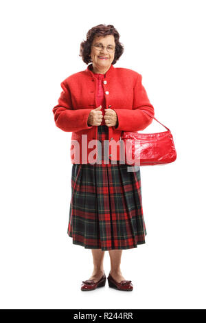 Volle Länge Portrait von eine ältere Frau mit einem roten Geldbeutel auf weißem Hintergrund Stockfoto