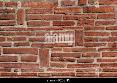 BRICK WALL, Textur und Charakter.. ZIEGELSTEIN-WAND, DIE BESCHAFFENHEIT UND ZEICHEN ZEIGT Stockfoto