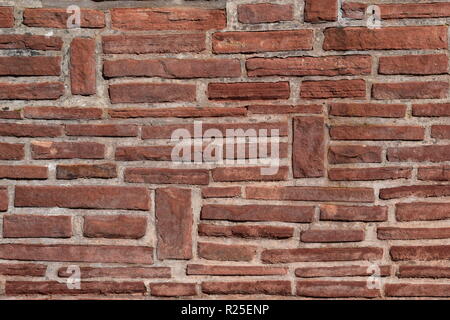 BRICK WALL, Textur und Charakter.. ZIEGELSTEIN-WAND, DIE BESCHAFFENHEIT UND ZEICHEN ZEIGT Stockfoto