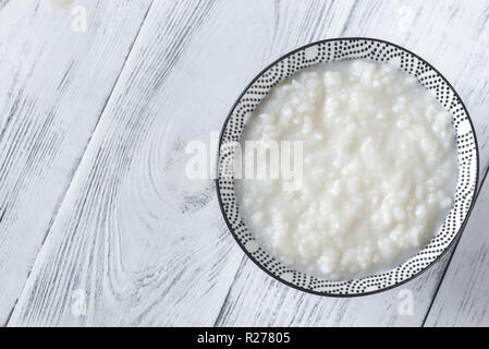 Schüssel congee - asiatische Reisbrei Stockfoto