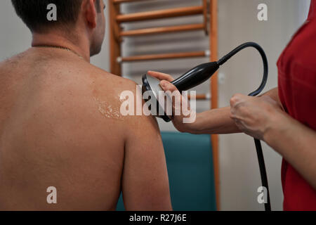 Stoßwellentherapie Stockfoto