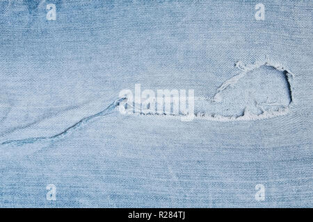 Jeans fragmentarischen Stoff leichte Textur Hintergrund Stockfoto