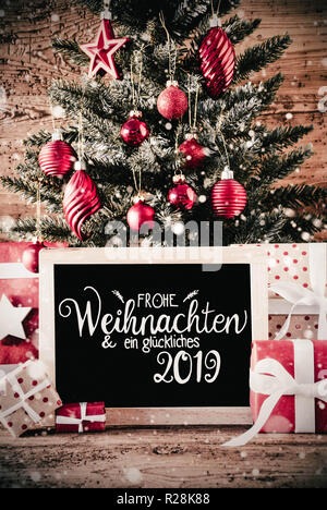 Vertikale Baum, Geschenke, Kalligraphie Glueckliches 2019 bedeutet Glücklich 2019 Stockfoto