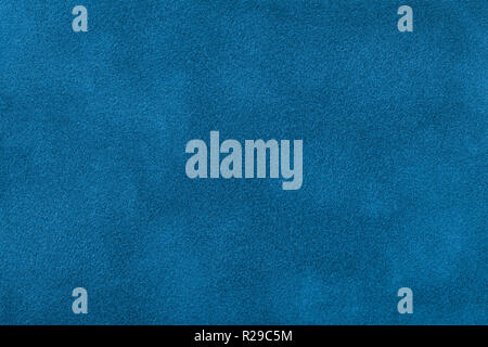 Navy Blue matte Hintergrund von Velours Stoff, Nahaufnahme. Samtene Textur von nahtlosen türkis Leder. Filzmaterial Makro. Stockfoto