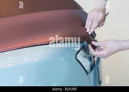 Einfügen von Auto Kohlensäure Kunststoff closeup Stockfoto