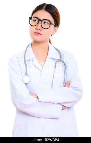 Studio erschossen Der junge schöne asiatische Frau Doktor mit Denken Stockfoto