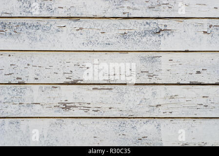 Alte bemalte Wand mit Planken Hintergrund Textur gemacht Stockfoto