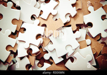 Puzzleteile als Hintergrund Stockfoto