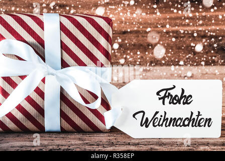Geschenk, Kalligraphie bedeutet Frohe Weihnachten Frohe Weihnachten, Schneeflocken Stockfoto