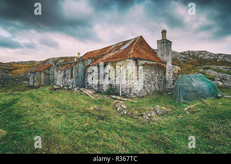 Ein verfallenes Cottage in Quidnish auf der Isle of Harris in Schottland Stockfoto