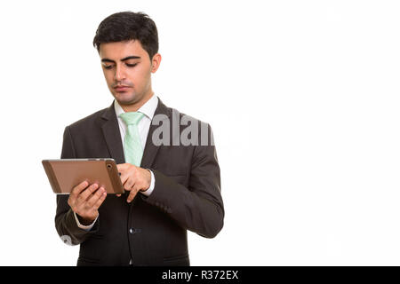 Jungen schönen persischen Geschäftsmann mit digitalen Tablet Stockfoto