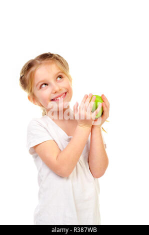 Kleines Mädchen mit Apple auf weißem Hintergrund Stockfoto