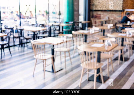 Blur restaurant Hintergrund. Verschwommenes Bild licht bild Hintergrund auf Kaffee Cafe Shop oder moderne Cafeteria Konzept. Stockfoto
