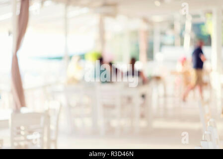 Bild des Abstrakten blur Restaurant mit Menschen. Restaurant mit Kunden für die Nutzung Stockfoto