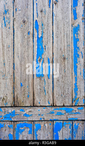 Türkis abblätternde Farbe auf Holz Tür Stockfoto