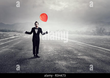 Junger Mann Mime. Mixed Media Stockfoto